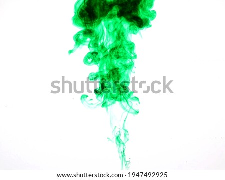 Take a picture of green ink into the water.