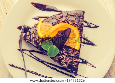 vintage photo of Dark Espresso Cake with Chocolate Glaze and orange