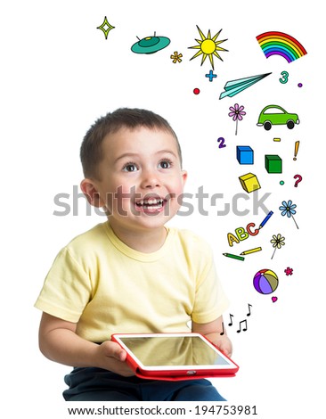 kid boy holding a tablet pc in hands and looking up