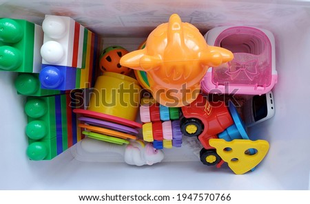 box with bright multi-colored children's toys