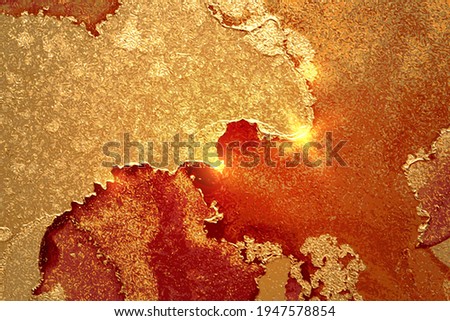 Gold and amber abstract marble background with sparkles. Vector texture in alcohol ink technique with glitter. Template for banner, poster design. Fluid art painting