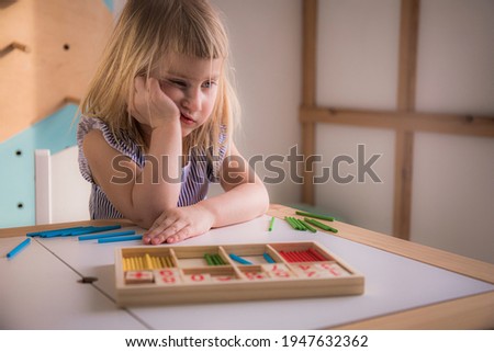 Little girl teaches math, lazy toddler doesn't want to learn to count, preschoolers home education, homeschool and bored girl.