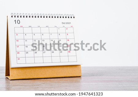 October Calendar 2021 on wooden table background. Royalty-Free Stock Photo #1947641323