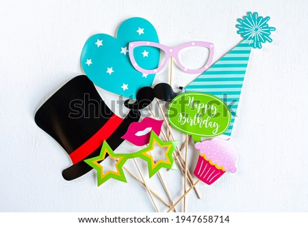 paper party accessories on white background