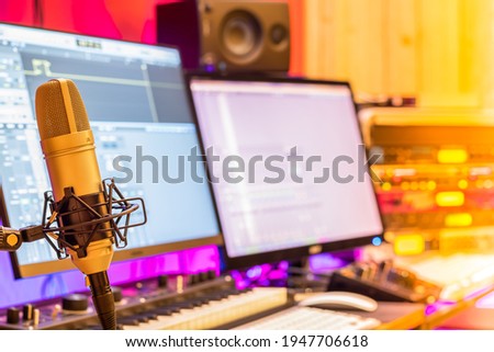 condenser microphone in studio for online meeting, post production, music production concept Royalty-Free Stock Photo #1947706618