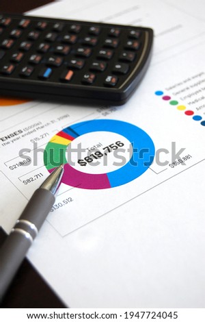 An overview of a financial diagram year end investment portfolio report. Royalty-Free Stock Photo #1947724045