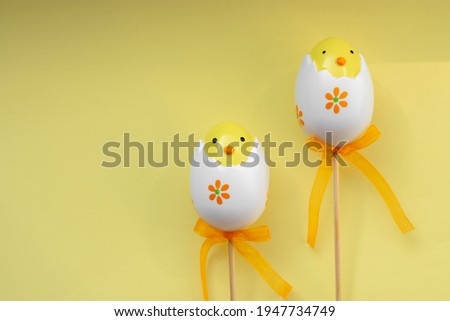 Easter eggs on yellow pastel background happy spring vibe celebrate holiday
