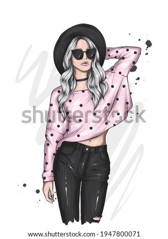 Beautiful hipster girl in a stylish hat, glasses, sweater and jeans. Fashion and style, clothing and accessories. Vector illustration for a postcard or poster.