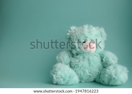 Cute teddy bear background picture. Mint green pastel colored image