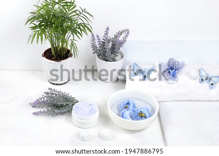 Spa and wellness composition with aromatic water, lavender, towels, aromatherapy and skincare, lifestyle concept, invitation and advertising card,