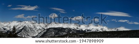 Vail ski resort in winter time with snow in the Colorado Rocky Mountains - uper long panoramic hi-resolution shot Royalty-Free Stock Photo #1947898909