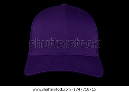 Purple baseball cap isolated on a black background front view