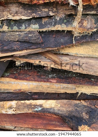a pile of wood that has been cut into firewood