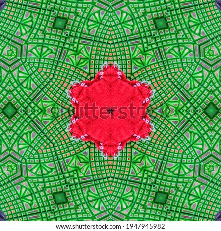an abstract photo with a green base color combined with red ornaments