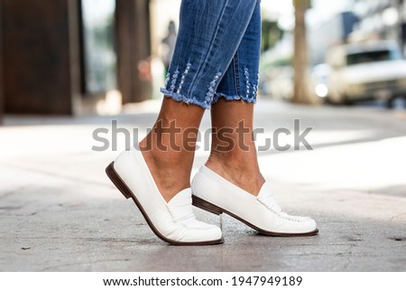 White leather loafers shoes women's fashion Royalty-Free Stock Photo #1947949189