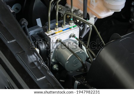 Anti lock Brake System (ABS) control unit box of car. Royalty-Free Stock Photo #1947982231