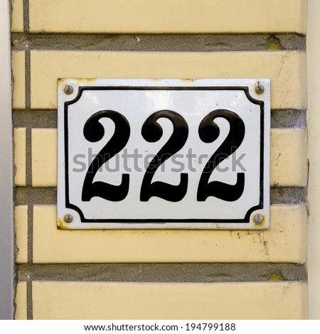 Enameled house number two hundred and twenty two.