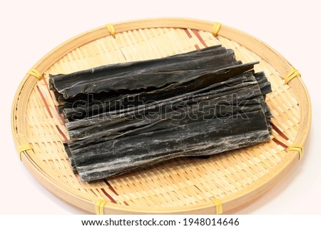 Dried cut kelp on woven bamboo tray