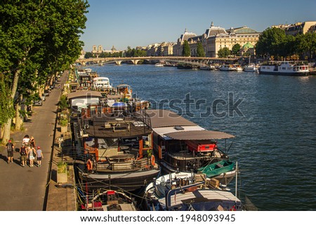 River seine Paris looking across to left bank and the musee d orsay the famous art gallery. High quality photo