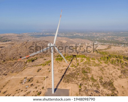 Wind turbine from aerial view - Sustainable development, environment friendly, renewable energy concept