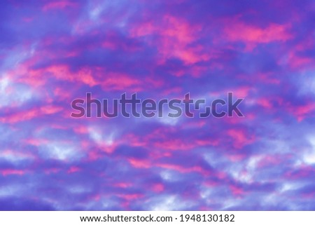 beautiful sunset sky with pink clouds as background