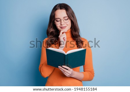 Photo of intelligent woman read book finger chin dream imagine on blue background