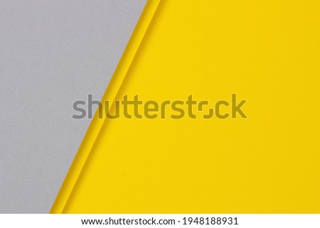 Abstract colored paper texture background. Minimal geometric shapes and lines in yellow and gray colors