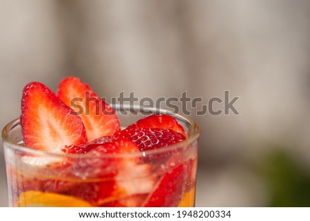 glass of water with fresh fruit
