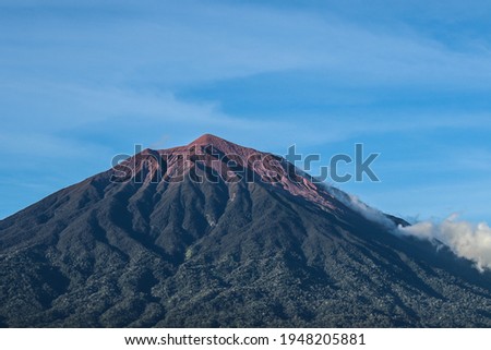 Mount Kerinci is the highest mountain in Sumatra and the highest volcano in Indonesia with an altitude of 3805 masl in the Kerinci Seblat National Park area. Kayu Aro, Kerinci, Jambi, Indonesia, Asia. Royalty-Free Stock Photo #1948205881