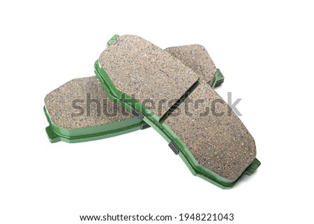 Set of brake pads, spare parts for a car, isolated on white