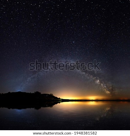 Amazing Panoramic Landscape view of a Milky Way. Milky Way over the lake.