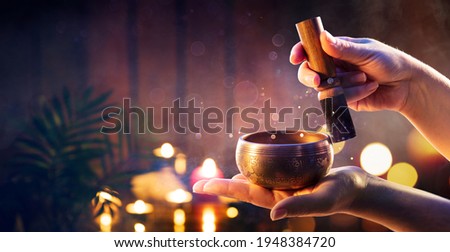 Tibetan Singing Bowl - Translation of mantras : transform your impure body, speech, and mind into the pure exalted body, speech, and mind of a Buddha
 Royalty-Free Stock Photo #1948384720