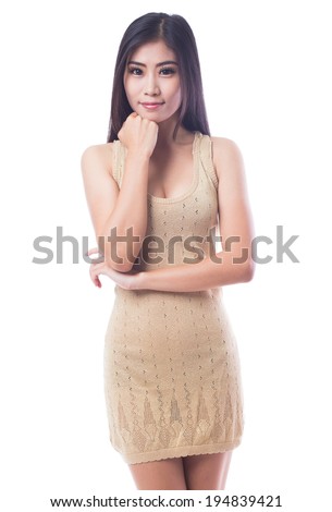 Casual asian young woman smiling and posing on white background