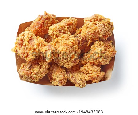paper take away box of fried chicken wings isolated on white background, top view Royalty-Free Stock Photo #1948433083