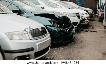 Wrecked cars after traffic accident crash. Insurance salvage vehicle auction wholesale storage. Featuring Used, Wholesale and Salvage Cars. Royalty-Free Stock Photo #1948434934