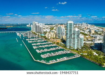 Aerial drone footage of Miami Beach marina in a wonderful day Royalty-Free Stock Photo #1948437751
