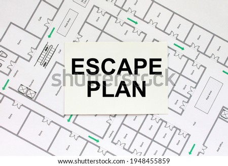 Business card with text Escape Plan on a construction drawing. Concept photo