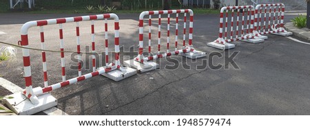 Metal security barriers to divide the area for safety