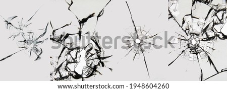 Set of cracks on broken glass, bullets from a bullet shot. Collage of 4 photos for design.