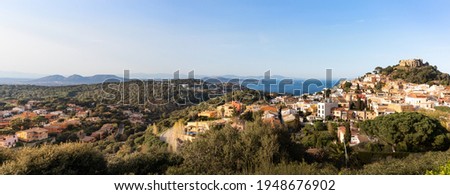 Medieval town with castle on a hill by the Mediterranean sea, treks and walks in the nature, traditional touristic village where Pyrenees meet the sea, Begur, Costa Brava, Spain. Panorama picture