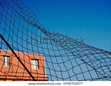 metal mesh and blue sky
