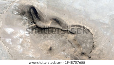 fossil seal,  abstract photography of the deserts of Africa from the air. aerial view of desert landscapes, Genre: Abstract Naturalism, from the abstract to the figurative, contemporary 