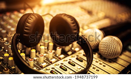 Headphone and microphone and audio sound mixer in studio for sound control system and recording equipment and music instrument.