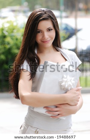 beautiful young girl with a gift
