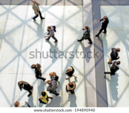 People walking, intentionally blurred post production background