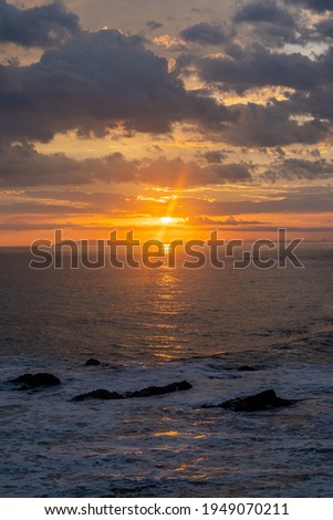 Beautiful colors of a sunset in the pacific ocean in the magical beaches of Costa Rica