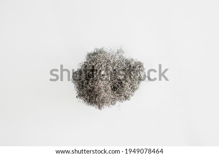 Steel wool on white background.metal sponge household