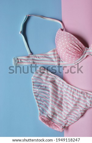 Crop image of Fashion woman underwear in pink and blue in concept summer fashion. 