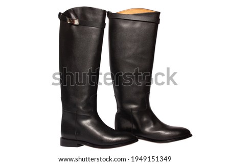 Black winter boots on a white background