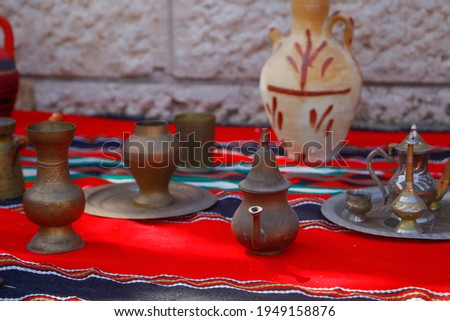 Old copper pots, Traditional old Arabic coffee pot, Ancient pottery. household utensils. Antique objects. Palestinian heritage. Qalqilya city. west bank, Palestine, April 4, 2021